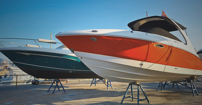 two boats on storage stands