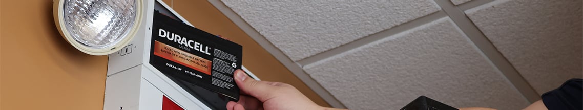 installing an SLA battery into an emergency light