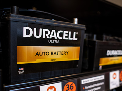Duracell Auto battery on a shelf
